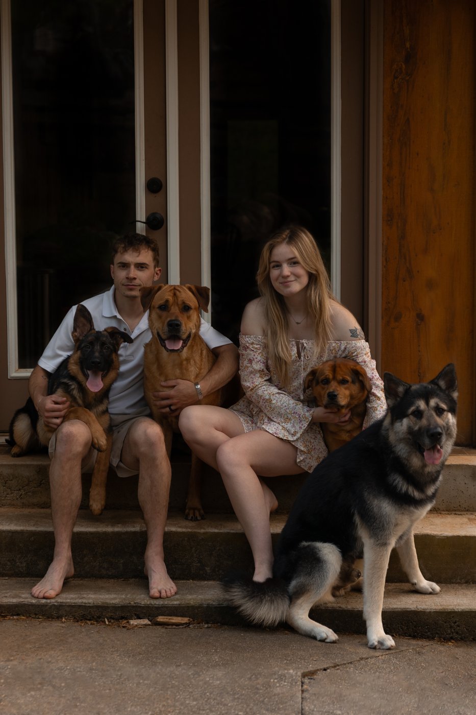 Family photo on the porch with the dogs